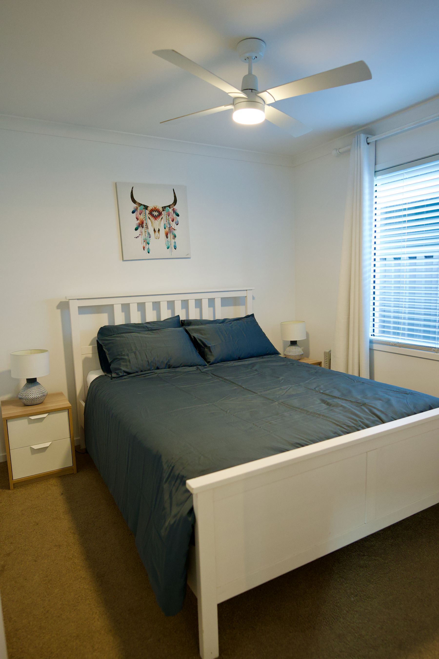 Bedroom with blue linen